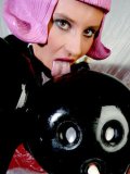 Kinky Peggy Sue And One More European Latex Girl Playing With Rubber Doll