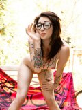 Softcore Session With Brunette In Glasses Angel Beau Flashing The Nude Body