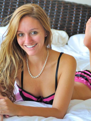 Chandler Fay In Beautiful Pink And Black Lingerie Exposes Her Slit On The Bed