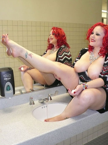 Tattooed Redhead April Flores Washes Her Bare Feet In The Public Bathroom